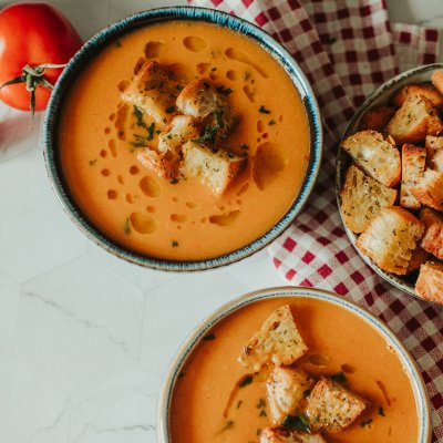 Delicious spiced tomato soup served with croutons