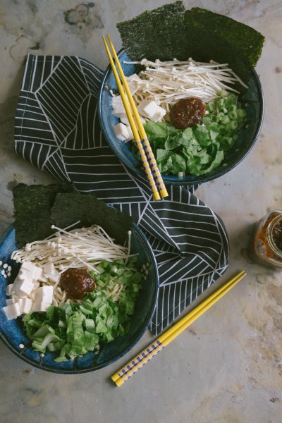 Delicious vegan ramen with added spicy paste in the bowls