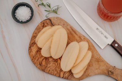 Sliced potatoes for chimichurri fries