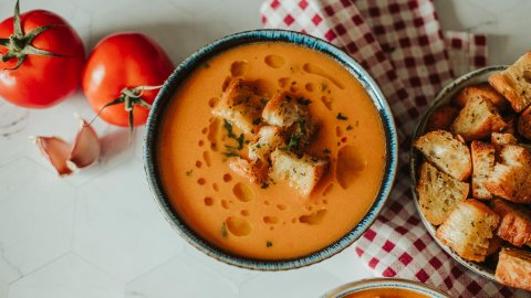 Delicious spiced tomato soup with croutons