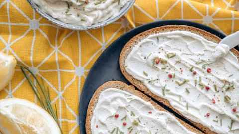 Fresh vegan cream cheese spread on bread