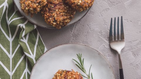 Vegan buckwheat patties served on two different plates